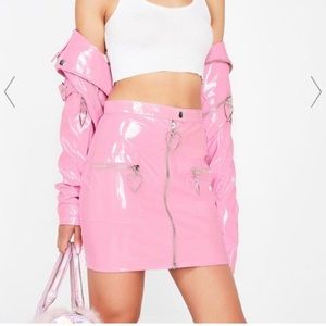 Sugar Thrillz pink pleather skirt w/metal hearts.
